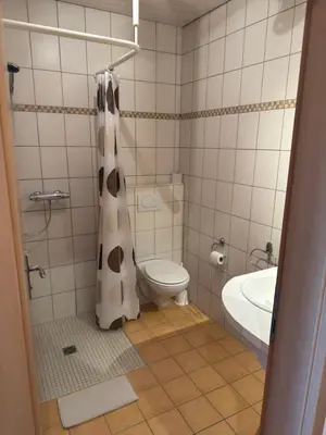 Ein Badezimmer in der Unterkunft Gasthof Janser