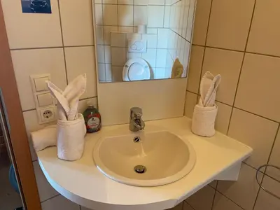 Ein Badezimmer in der Unterkunft Gasthof Janser