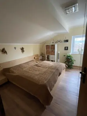 Ein Bett oder Betten in einem Zimmer der Unterkunft Alpen-Stadt Idylle