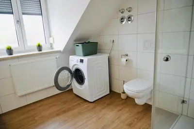 Ein Badezimmer in der Unterkunft Komfort-Apartment - 93m2 - Zentral - Nähe Stadtpark