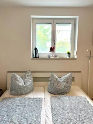 Ein Bett oder Betten in einem Zimmer der Unterkunft Schönes Appartement mit Terrasse und nur 5 Min zur SBahn