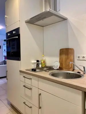 Küche/Küchenzeile in der Unterkunft Schönes Appartement mit Terrasse und nur 5 Min zur SBahn