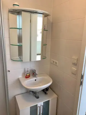 Ein Badezimmer in der Unterkunft Schönes Appartement mit Terrasse und nur 5 Min zur SBahn