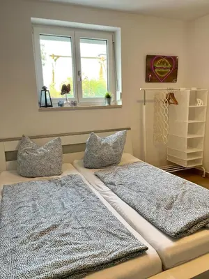 Ein Bett oder Betten in einem Zimmer der Unterkunft Schönes Appartement mit Terrasse und nur 5 Min zur SBahn