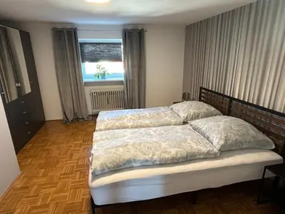 Ein Bett oder Betten in einem Zimmer der Unterkunft Schöne Ferienwohnung in Landsberg am Lech