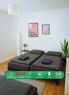 Ein Bett oder Betten in einem Zimmer der Unterkunft Zentral und Modern, komfortable Luxuswohnung, Isarnähe