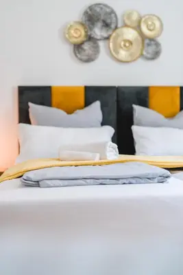 Ein Bett oder Betten in einem Zimmer der Unterkunft YAYstay - 