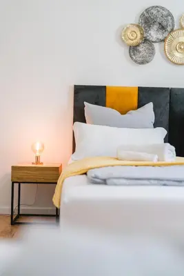 Ein Bett oder Betten in einem Zimmer der Unterkunft YAYstay - 