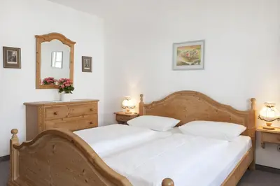 Ein Bett oder Betten in einem Zimmer der Unterkunft Landhaus Theresa