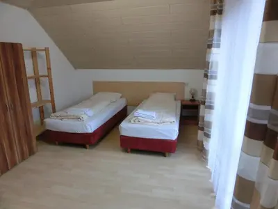 Ein Bett oder Betten in einem Zimmer der Unterkunft Unterkunft DHH mit 5 Zim