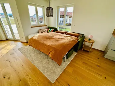 Ein Bett oder Betten in einem Zimmer der Unterkunft Wildes Wohnen