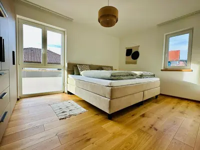 Ein Bett oder Betten in einem Zimmer der Unterkunft Wildes Wohnen