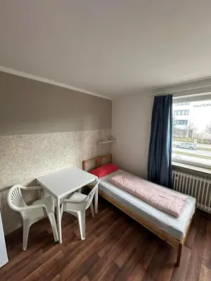 Ein Bett oder Betten in einem Zimmer der Unterkunft 2-Rent Group Hostel Apartments HAN53