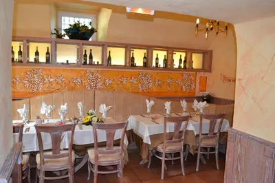 Ein Restaurant oder anderes Speiselokal in der Unterkunft Il Gladiatore