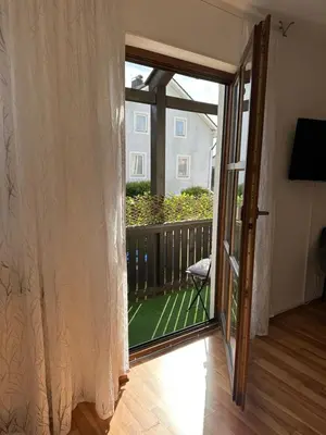 Ein Garten an der Unterkunft Cozy City Apartment Penzberg