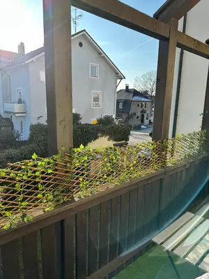Ein Garten an der Unterkunft Cozy City Apartment Penzberg