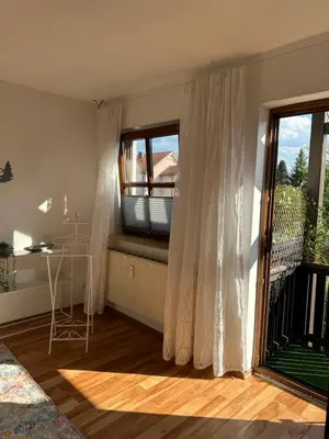 Ein Balkon oder eine Terrasse in der Unterkunft Cozy City Apartment Penzberg