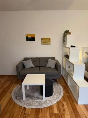 Ein Sitzbereich in der Unterkunft Cozy City Apartment Penzberg