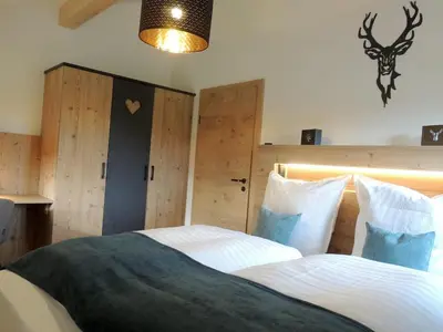 Ein Bett oder Betten in einem Zimmer der Unterkunft Moarhof Hackling - Ferienwohnung Anian