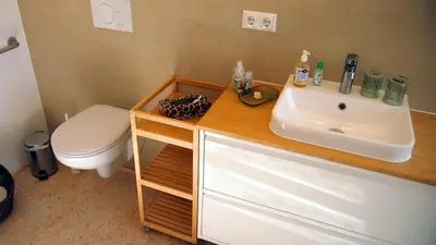 Ein Badezimmer in der Unterkunft Im Laden