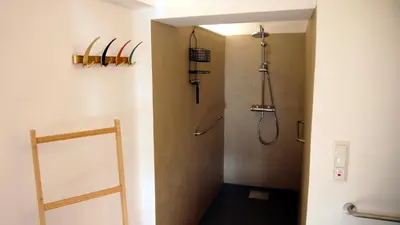 Ein Badezimmer in der Unterkunft Im Laden