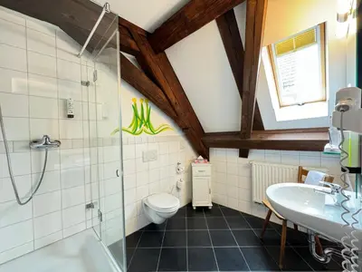 Ein Badezimmer in der Unterkunft Hotel Haimerlhof