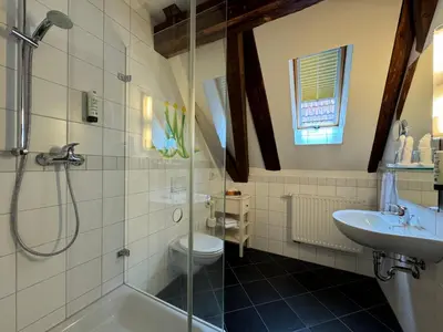 Ein Badezimmer in der Unterkunft Hotel Haimerlhof