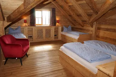 Ein Bett oder Betten in einem Zimmer der Unterkunft Naturhotel & Bayernhütte am Brauneck