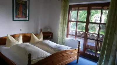 Ein Bett oder Betten in einem Zimmer der Unterkunft Pension Aufeld