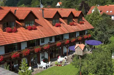 Ein Garten an der Unterkunft Pension Aufeld