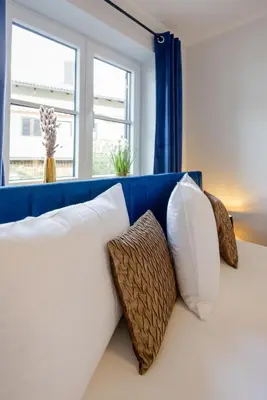 Ein Bett oder Betten in einem Zimmer der Unterkunft UNiQE I Luxuriöses 145qm Apartment