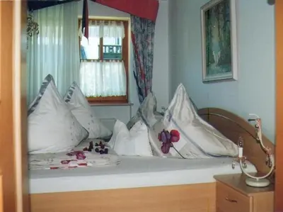 Ein Bett oder Betten in einem Zimmer der Unterkunft Ferienwohnung Löster
