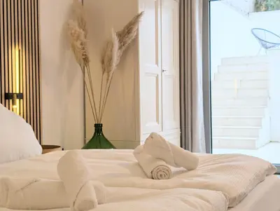 Ein Bett oder Betten in einem Zimmer der Unterkunft Neu! Münchner Oase mit zwei Terassen