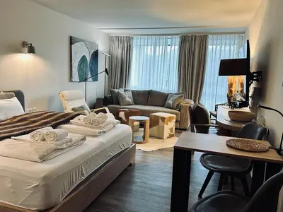 Ein Sitzbereich in der Unterkunft Apartment Schlierseeperle
