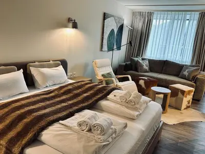 Ein Bett oder Betten in einem Zimmer der Unterkunft Apartment Schlierseeperle
