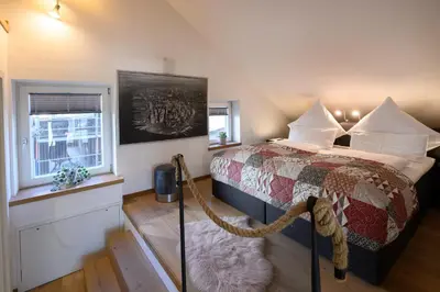 Ein Bett oder Betten in einem Zimmer der Unterkunft Das Loft