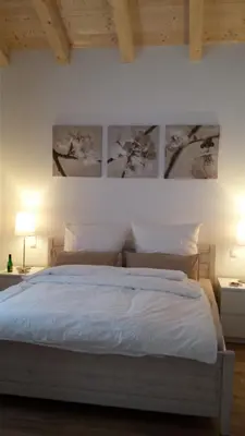 Ein Bett oder Betten in einem Zimmer der Unterkunft Ferienwohnung Vitalis