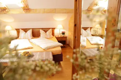 Ein Bett oder Betten in einem Zimmer der Unterkunft Lindlweberhof