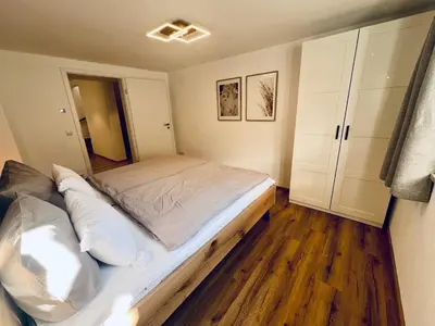 Ein Bett oder Betten in einem Zimmer der Unterkunft Ferienhaus Zum Luis