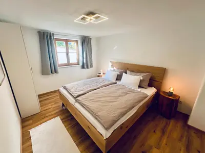 Ein Bett oder Betten in einem Zimmer der Unterkunft Ferienhaus Zum Luis