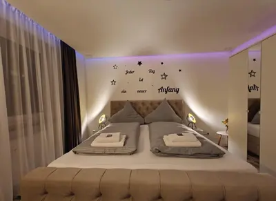 Ein Bett oder Betten in einem Zimmer der Unterkunft Modern Apartments Neuburg O - NEU - 2 Zimmer, Komfort, Top Ausgestattet, Smart TV, Wi-Fi