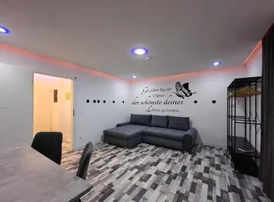 Ein Sitzbereich in der Unterkunft Modern Apartments Neuburg O - NEU - 2 Zimmer, Komfort, Top Ausgestattet, Smart TV, Wi-Fi