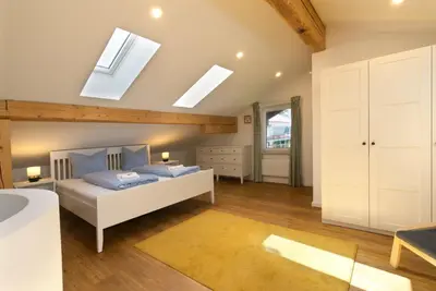 Ein Bett oder Betten in einem Zimmer der Unterkunft Karwendeltreppchen -415-