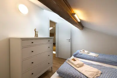 Ein Bett oder Betten in einem Zimmer der Unterkunft Karwendeltreppchen -415-