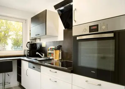 Küche/Küchenzeile in der Unterkunft Modern Apartments Neuburg S - NEU - 2 Zimmer, Parkplatz, Wi-Fi, TV, Küche