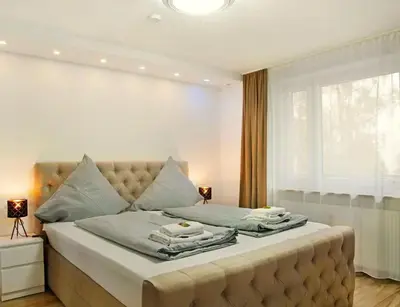 Ein Bett oder Betten in einem Zimmer der Unterkunft Modern Apartments Neuburg SP - NEU - 2 Zimmer, Komfort, Top Ausgestattet, Smart TV, Wi-Fi