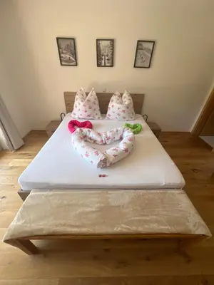 Ein Bett oder Betten in einem Zimmer der Unterkunft Ferienwohnung Mühlleiten