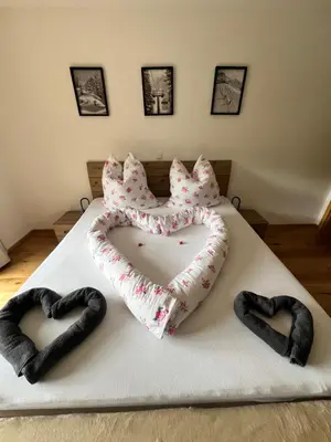 Ein Bett oder Betten in einem Zimmer der Unterkunft Ferienwohnung Mühlleiten