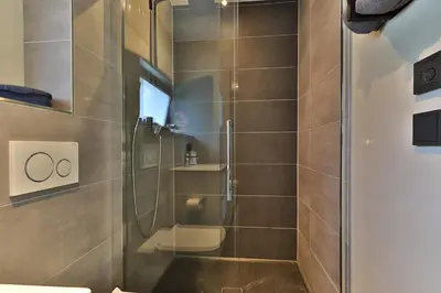 Ein Badezimmer in der Unterkunft Moderne DHH mit zwei Apartments