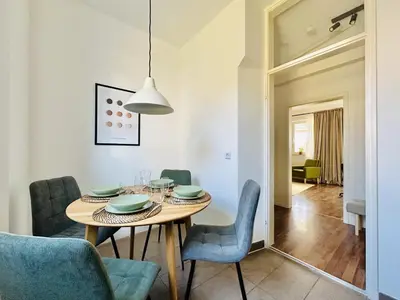 Ein Sitzbereich in der Unterkunft Apartment Daniel - Stilvolle Wohnung mit Veranda für 4 Personen